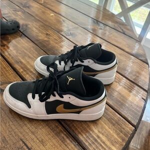 Jordan Black and Gold Sneakers